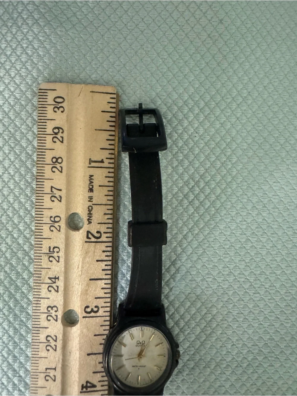 Q&Q Black and Gold Analog Quartz Watch for Everyday Wear